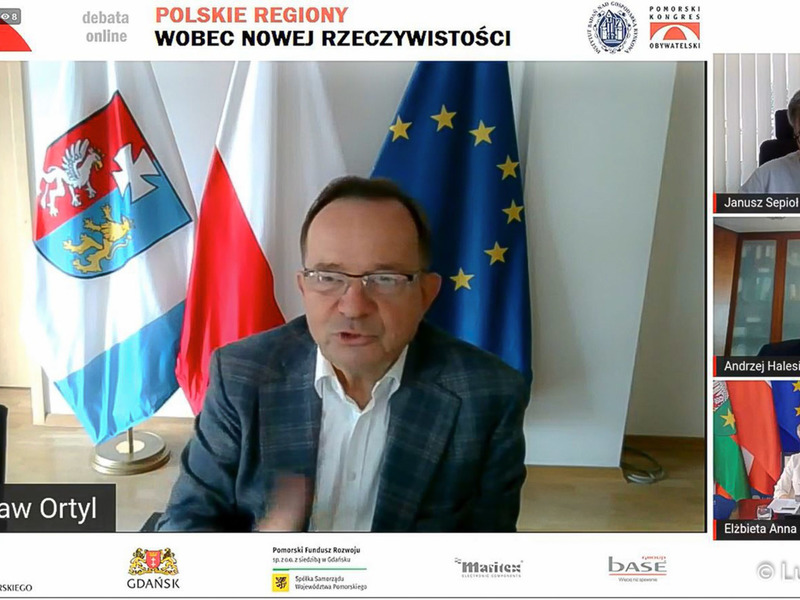 Monitor z uczestnikami debaty online pt. Polskie regiony wobec nowej rzeczywistości. Na zdjęciu głównym Marszałek Województwa Podkarpackiego Władysław Ortyl.