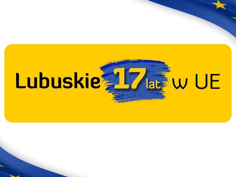 Napis "Lubuskie 17 lat w UE" na żółtym tle pomiędzy unijnymi flagami.