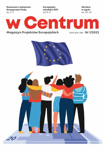 Zdjęcie przedstawia okładkę magazynu w centrum. Młodzi ludzie z flaga Unii Europejskiej