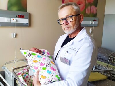 Lek. Jerzy Hołowczyc z małym Nikodemem